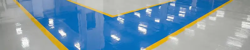 A factory floor professionally covered and marked with epoxy flooring in Reno, NV