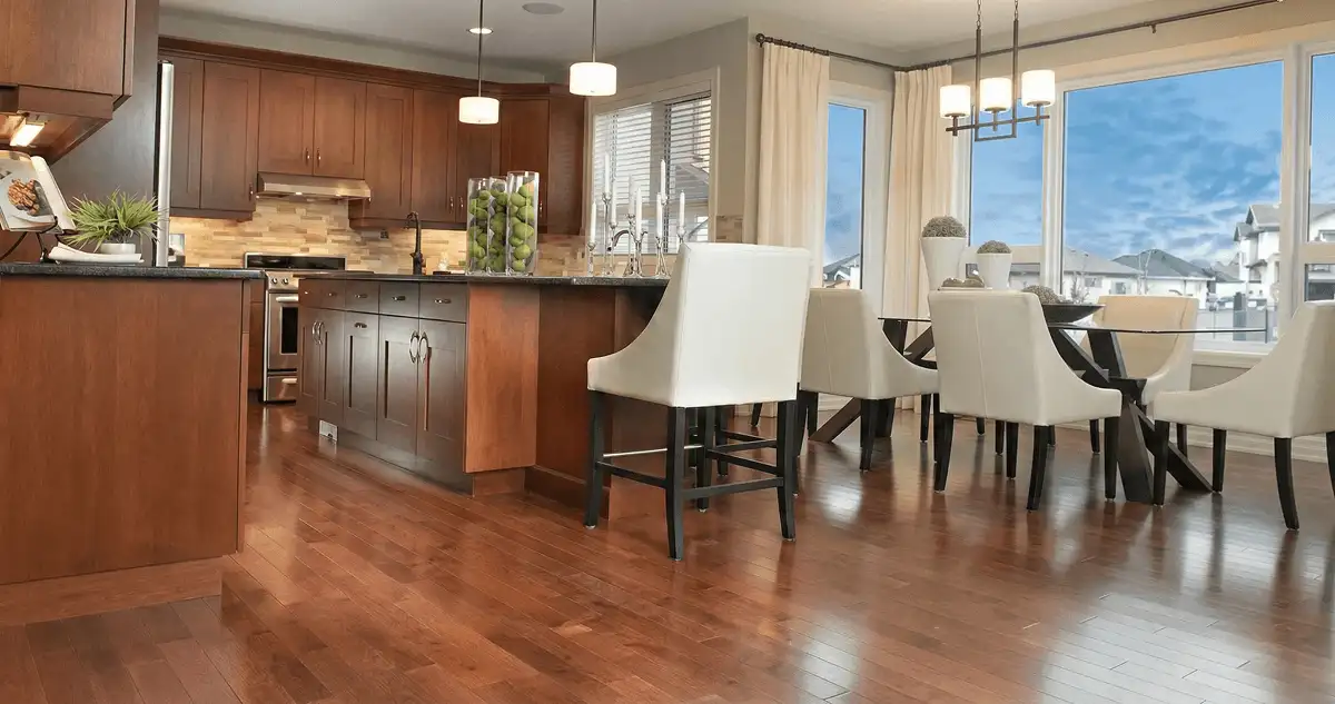 A modern kitchen with professionally installed wood flooring in Reno, NV