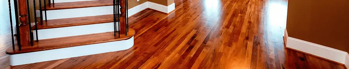 Base floor of a staircase with professionally restored wood flooring in Reno NV