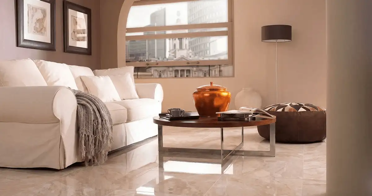 Modern living room with professionally installed marble flooring, a beige sofa, coffee table in Reno, NV