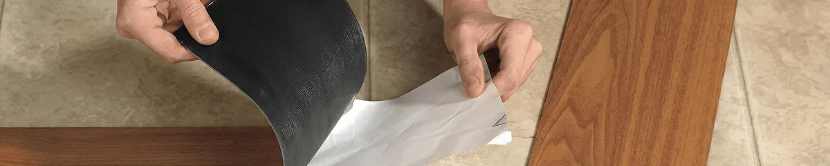 A professional installing vinyl flooring in Reno, NV